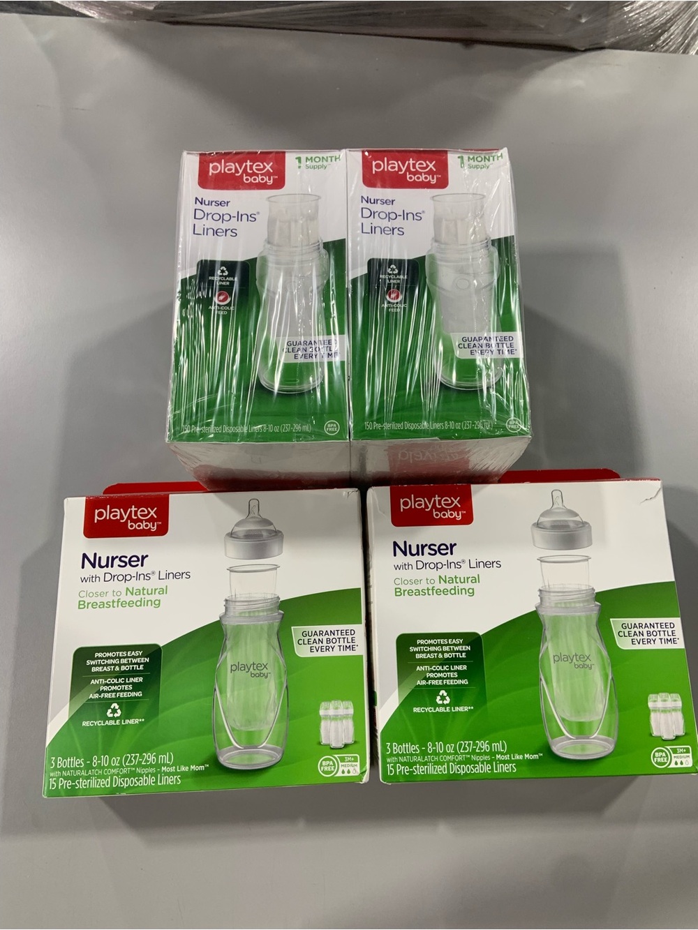 Playtex baby nurser - 
6 bottles (8oz) and 300 drop-ins liners -all as pictured!